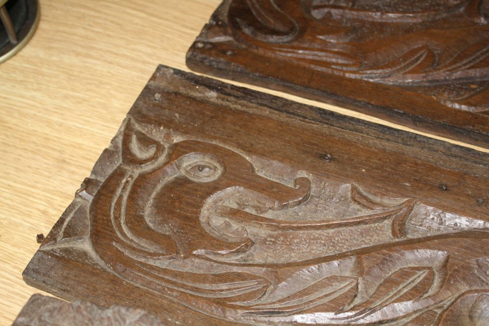 Three 19th century Continental carved oak corbels, carved with lion masks and a pair of scroll and dragon carved frieze panels